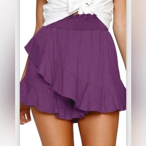 Never worn.  Wrap skort.  Beach Flowy High Waisted dark purple size large